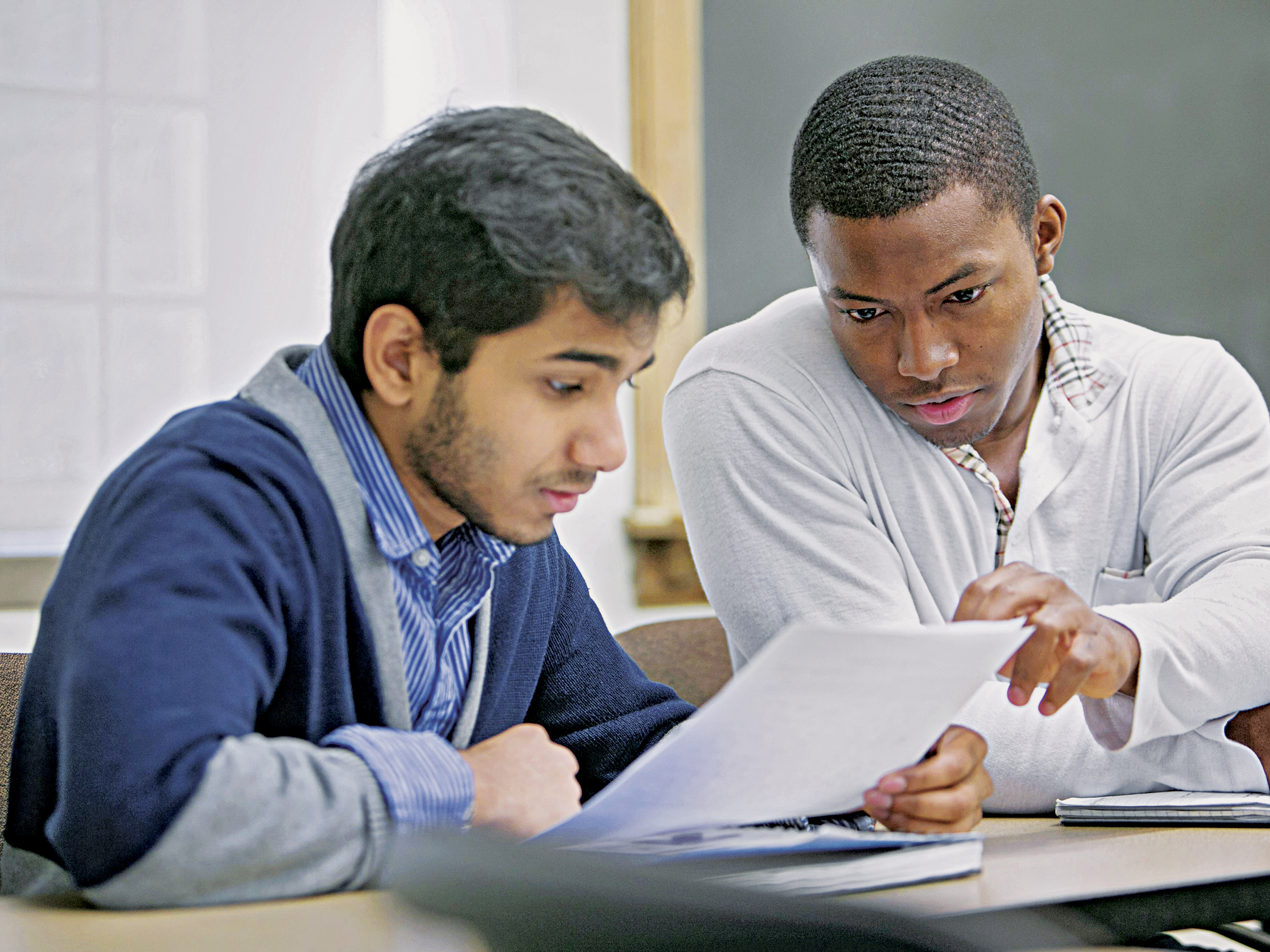 2 male students studying